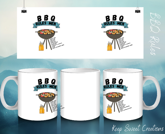 “BBQ Rules coffee mug with grill master design – white ceramic cup featuring BBQ tools and bold text, perfect gift for dads who love to grill