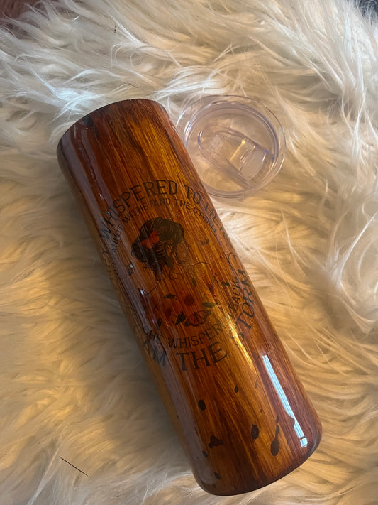 20 oz woodgrain tumbler with the quote “I am the storm,” includes lid and straw—designed for fierce, empowered women