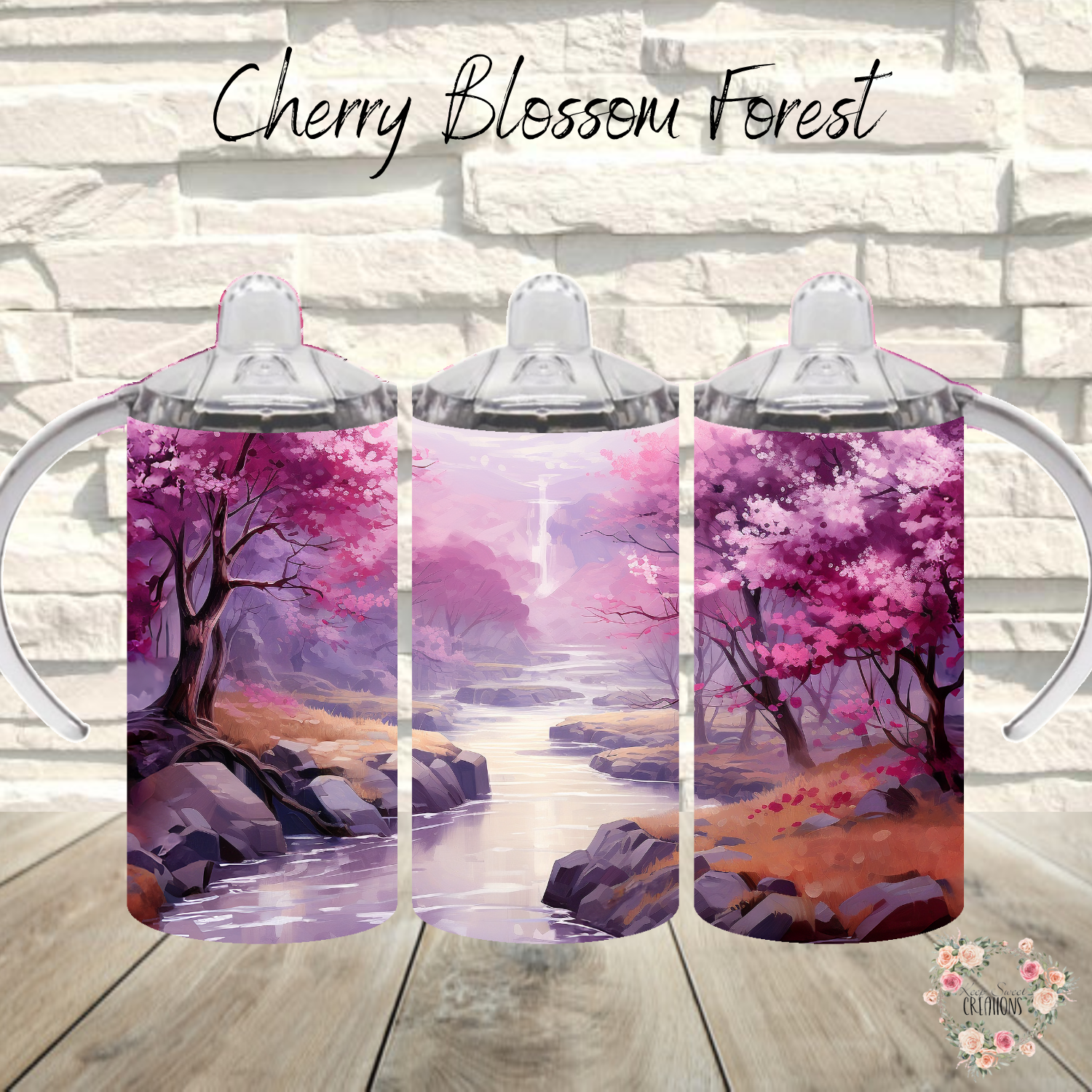 cherry blossom themed tumblers with a pink and purple artistic design.