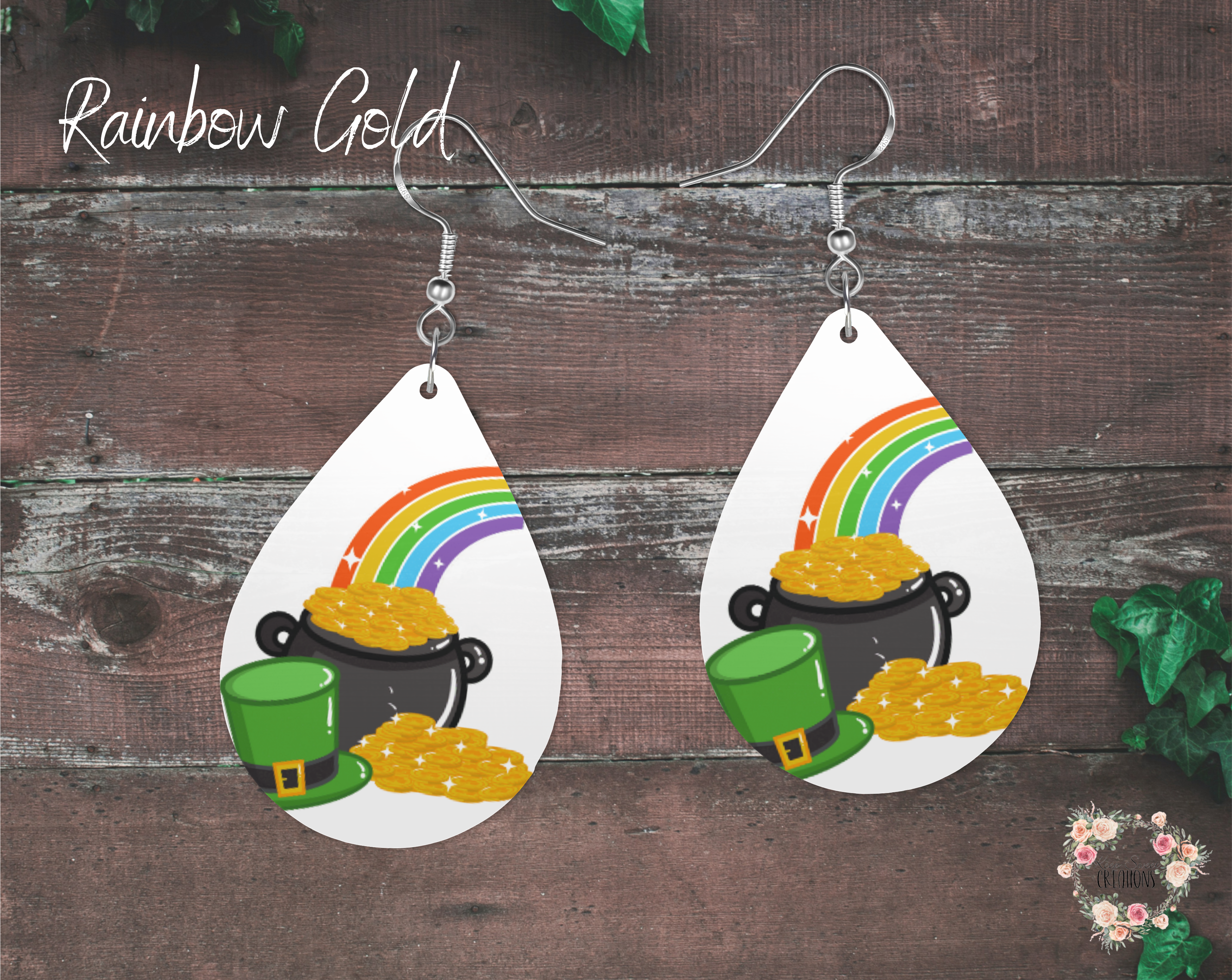 "A pair of teardrop-shaped St. Patrick’s Day earrings featuring a black pot filled with gold coins, a green leprechaun hat, and a colorful rainbow in the background. The design is printed on lightweight sublimation wood with nickel-free hypoallergenic hooks, making them a fun and festive holiday accessory."