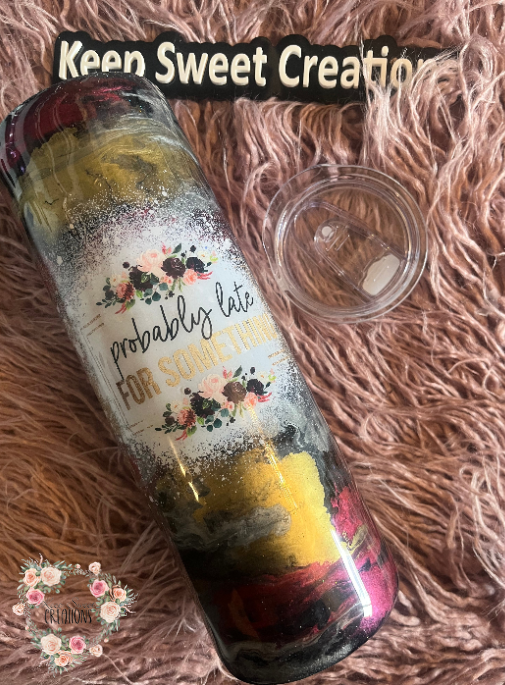 30 oz epoxy tumbler with gold, black, and deep red swirls and “Probably Late for Something” floral design, includes lid and straw
