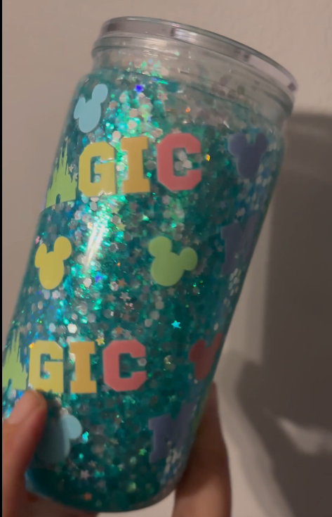Magic snow globe tumbler with floating glitter effect, custom handmade glitter cup for iced coffee and cold drinks